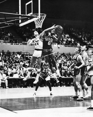 Bill Russell takes ball away