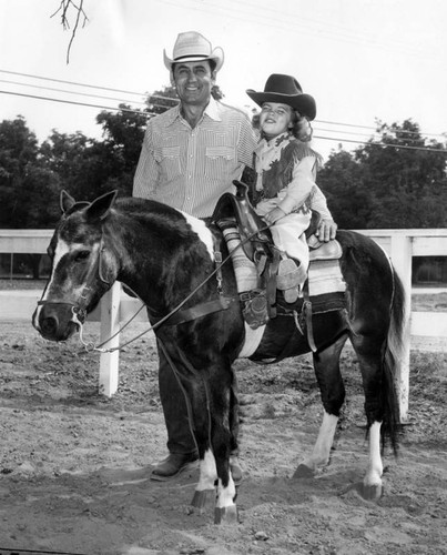 Valleys tiniest cowgirl limbers up pony for Santa Barbara Spanish Day Fiesta