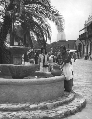 Women at the fountain on Olvera Street