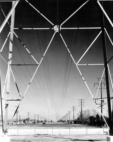 View of electric lines, poles, and towers