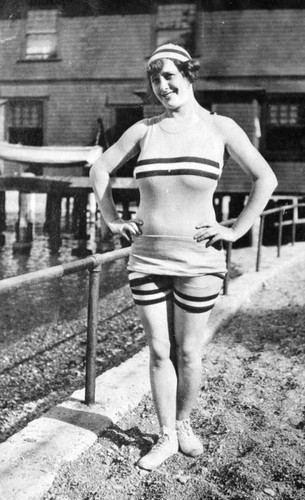 Young woman poses in bathing suit