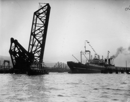 The C.A. Larsen passes through a bascule bridge