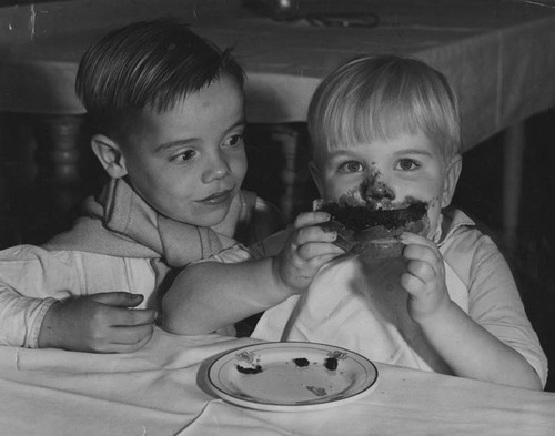 Orphan children eating