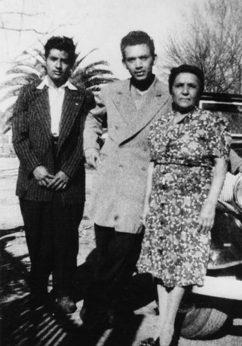 Woman with two young men