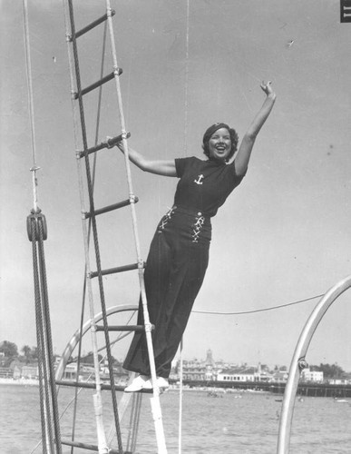Young woman waving