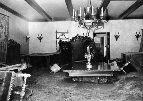 Three feet of mud cover formal dining room of Stetson home