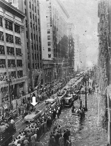 Gen. Dwight D. Eisenhower rides down Spring Street