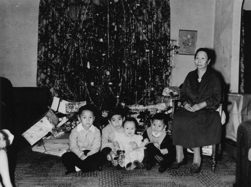 Family with Christmas tree