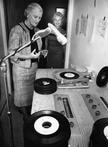 Mrs. Bernice Copeland checks records