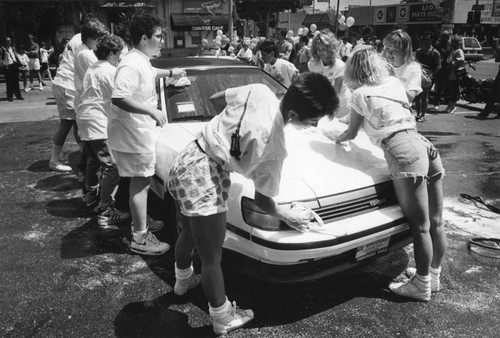 Car wash sponsored by the Laker Girls