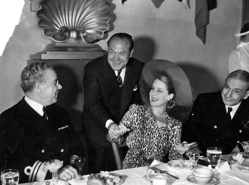 Norma Shearer with naval officers