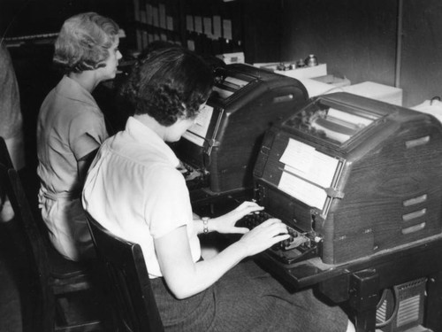 Teletype operators at Central Casting — Calisphere