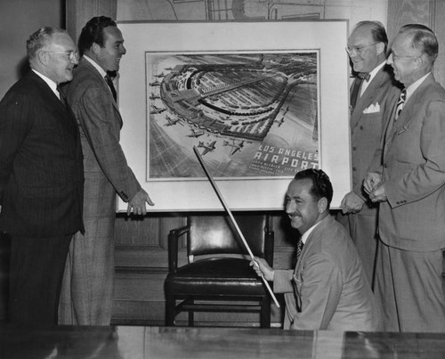 Bowron looks at airport sketch