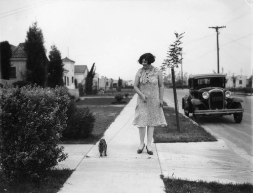 Woman walking ocelot