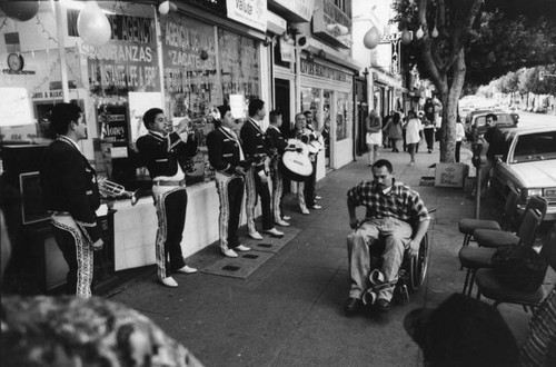 Mariachis serenade pedestrians, Boyle Heights