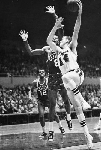 Bill Russell attempts a block