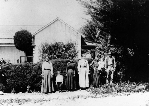 Group at side of house