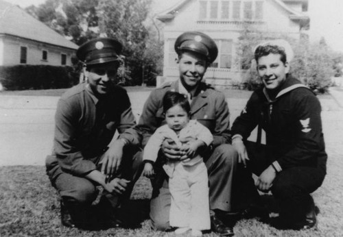 Mexican American soldiers with baby