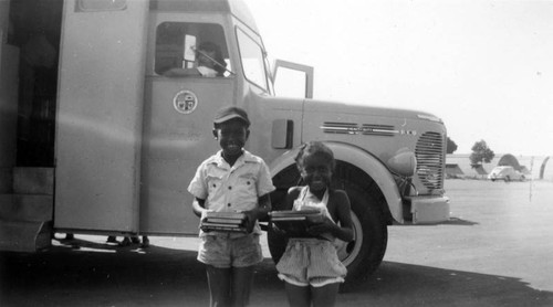 Early readers at the LAPL Traveling Branch Bookmobile