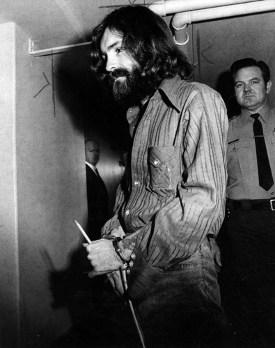 Charles Manson enters court