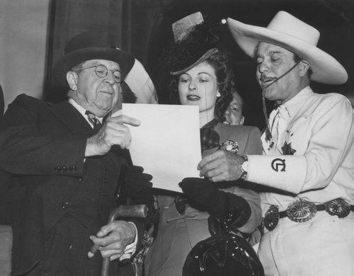 Rupert Hughes, Ruth Hussey and Leo Carrillo