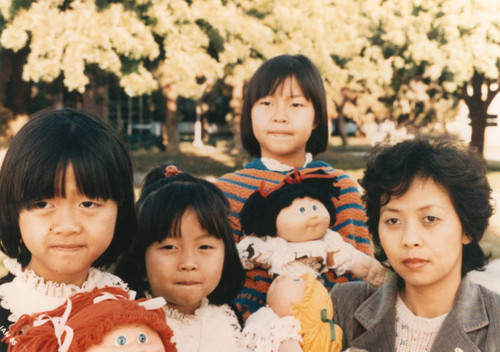 Vietnamese mother and daughters, a portrait