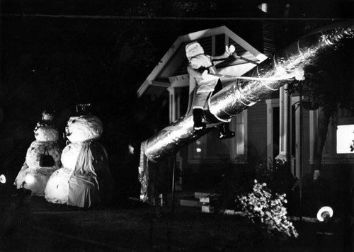 Santa rides rocket at 638 Magnolia Blvd., Burbank