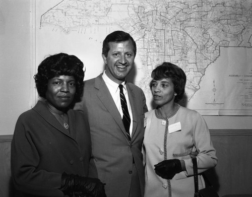 Charles Warren with unidentified women