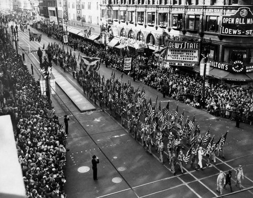 Boy Scouts march with flags, Armistice day parade