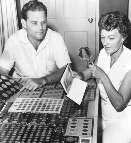 Paul Newell and wife Mary Ellen with coin collection