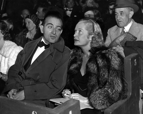 Fritz Lang with Miriam Hopkins at outdoor premiere