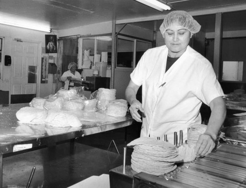 Bagging tortillas, La Fortaleza, Inc