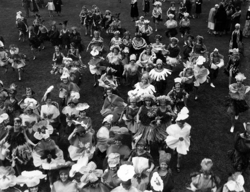 Children in flower costumes