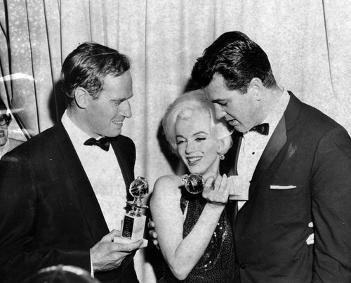 Charlton Heston and Marilyn Monroe