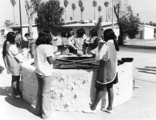 Sherman Indian High School students making fry bread