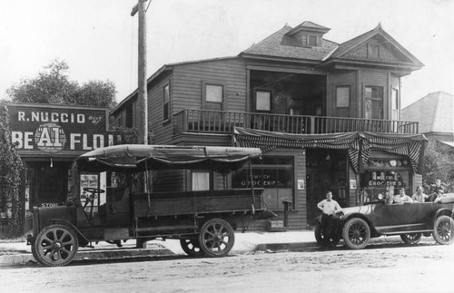 Nuccio Family in front of their grocery store