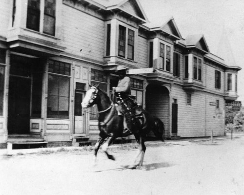 Horseman on street