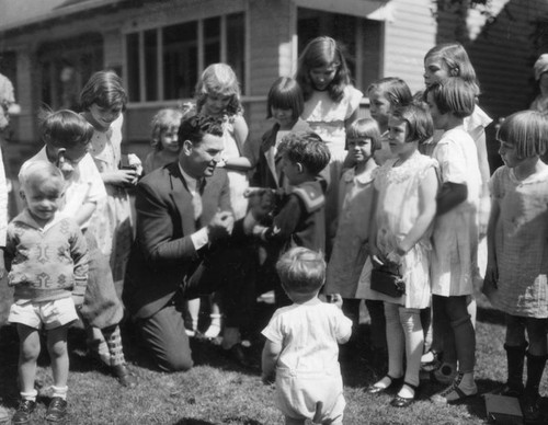 Dempsey with children, view 6