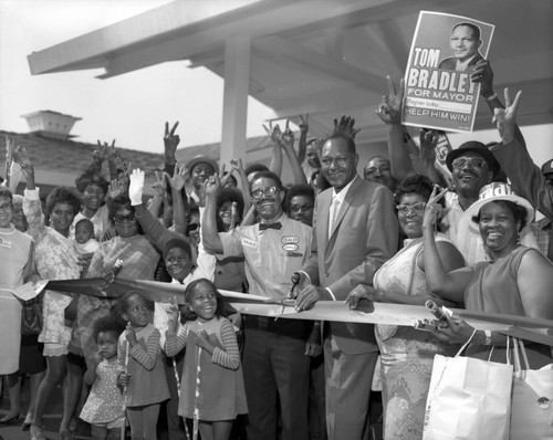 Tom Bradley and waving crowd