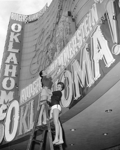 Two women on a ladder, Egyptian Theatre