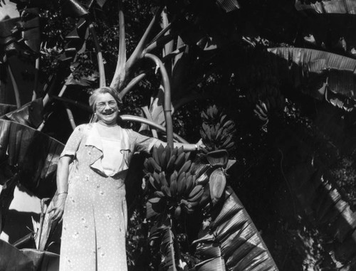 Woman with banana tree