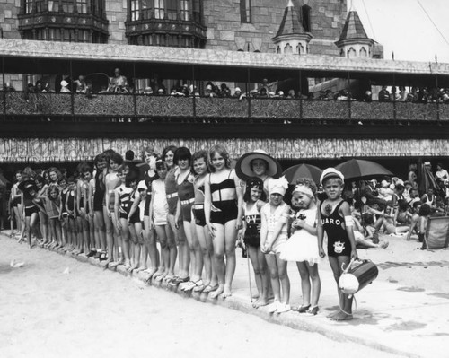 Junior life guard and bathing beauties at Deauville Club