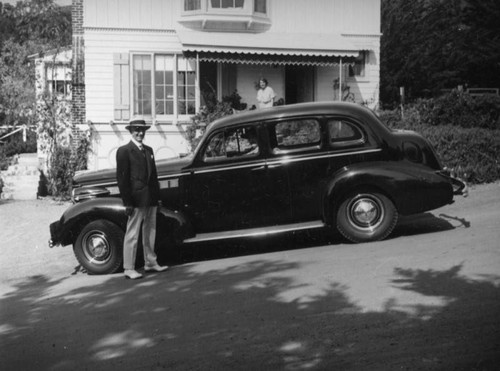 Mrs. Morton parked in front of her Laguna Beach home