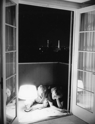 Ethel and Herman Schultheis on balcony at home