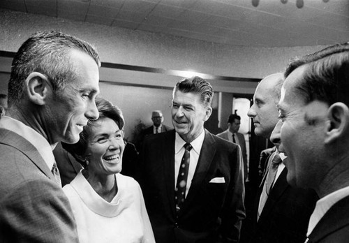 Govenor Reagan and wife talk with astronauts