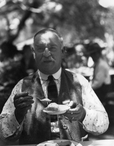 Man eating at picnic