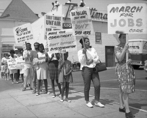 Demonstrators outside the Thriftimart