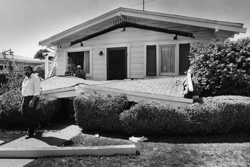 Porch collapses during quake