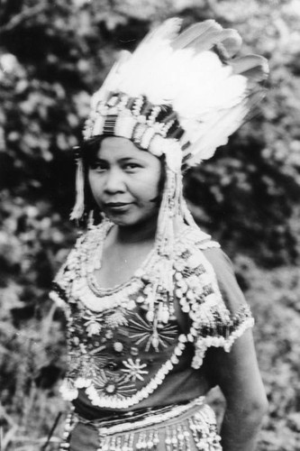 Klamath Indian woman wearing feathers and beads