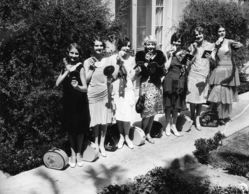 Seven beauties in stylish attire